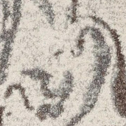 7' X 10' Brown And Ivory Abstract Area Rug