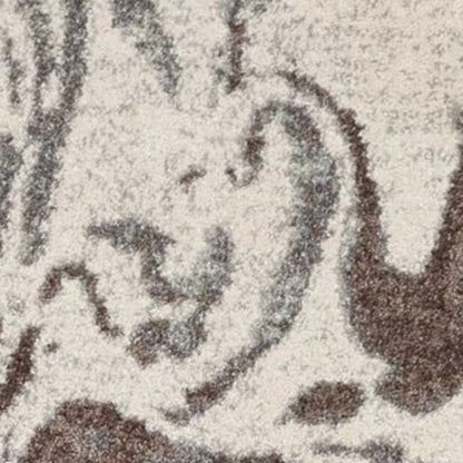 7' X 10' Brown And Ivory Abstract Area Rug