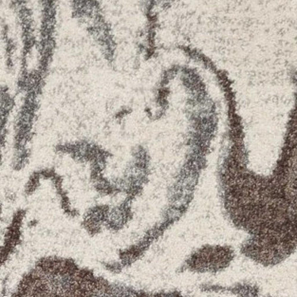 7' X 10' Brown And Ivory Abstract Area Rug