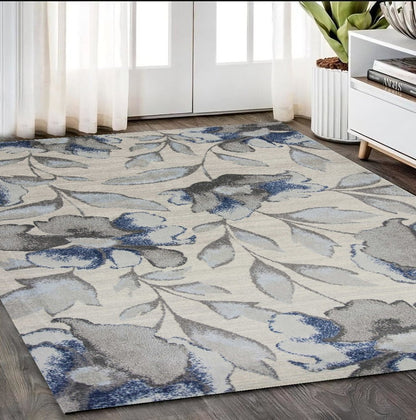 9' X 13' Ivory Blue And Gray Floral Vines Area Rug