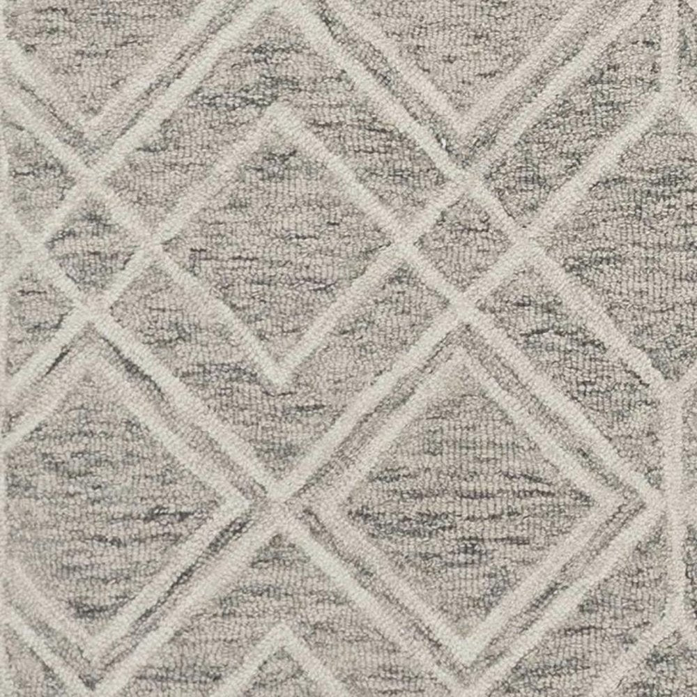 5' X 7' Sand Beige And Ivory Wool Geometric Hand Hooked Area Rug