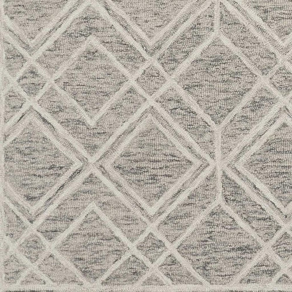 5' X 7' Sand Beige And Ivory Wool Geometric Hand Hooked Area Rug