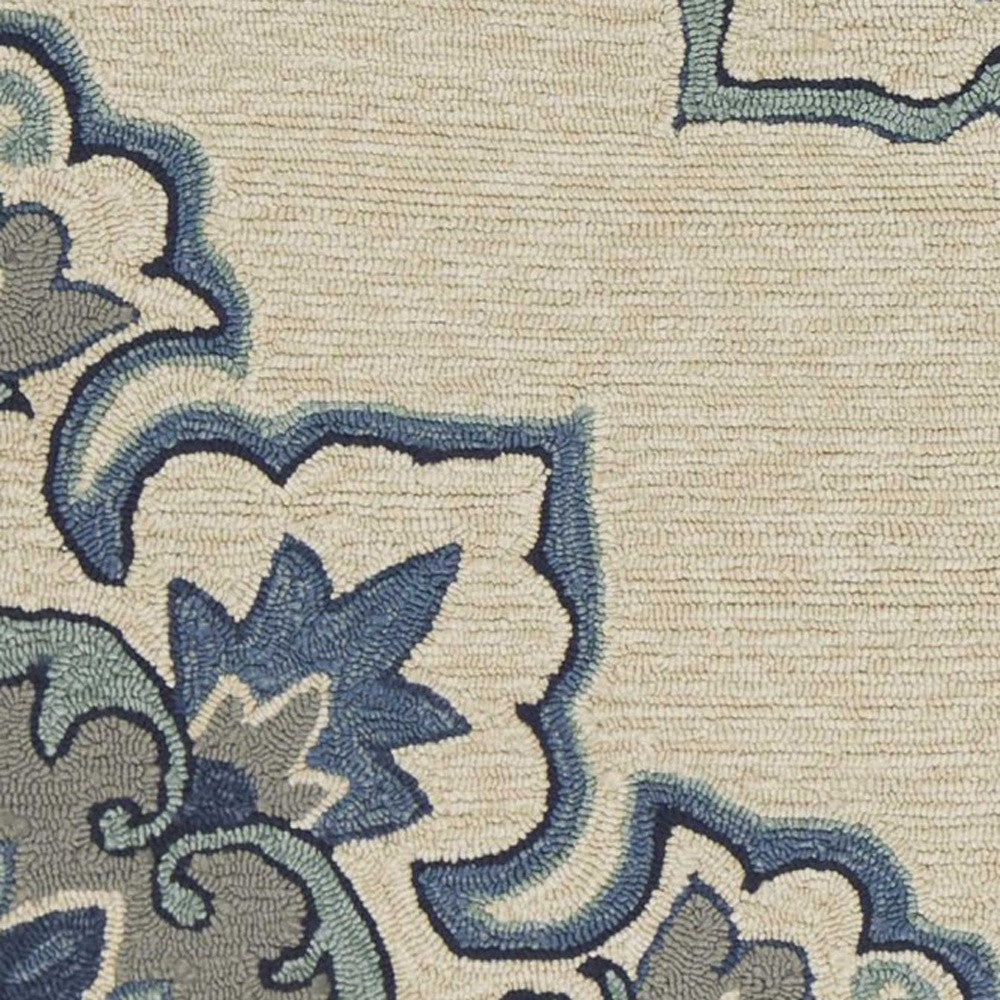 5' X 8' Ivory and Blue Damask Handmade Indoor Outdoor Area Rug