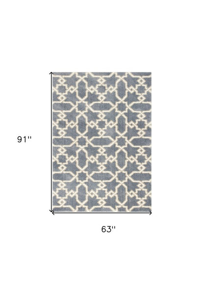 5' X 8' Slate Blue And Ivory Geometric Area Rug