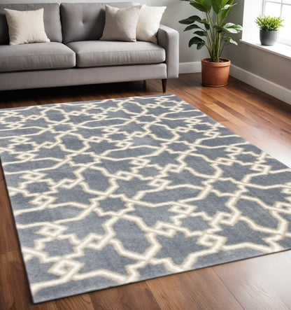 3' X 5' Slate Blue And Ivory Geometric Area Rug