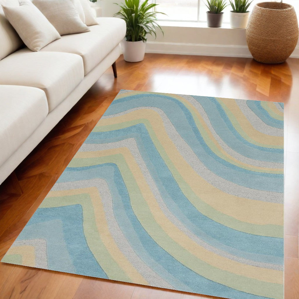 5' X 8' Ocean Blue Beige Hand Tufted Abstract Waves Indoor Area Rug