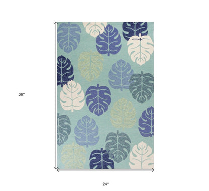 7' X 9' Turquoise And Ivory Botanical Leaves Hand Tufted Area Rug