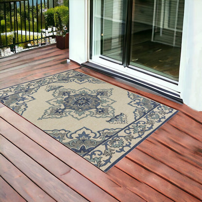 5' X 8' Ivory And Blue Damask Indoor Outdoor Area Rug