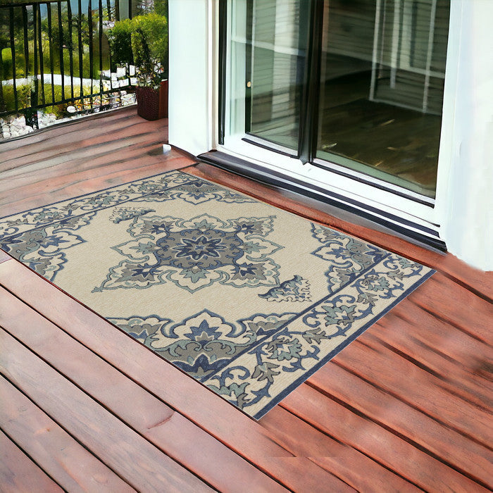 5' X 8' Ivory And Blue Damask Indoor Outdoor Area Rug