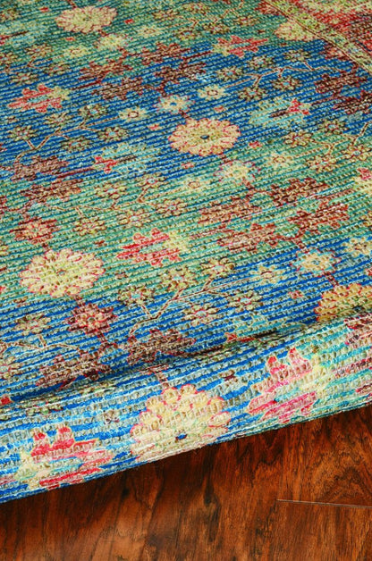 5' X 7' Blue Red And Beige Floral Medallion Hand Woven Distressed Area Rug
