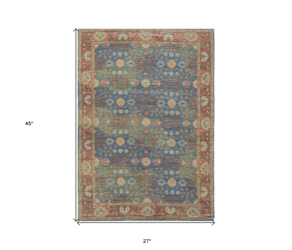 5' X 7' Blue Red And Beige Floral Medallion Hand Woven Distressed Area Rug