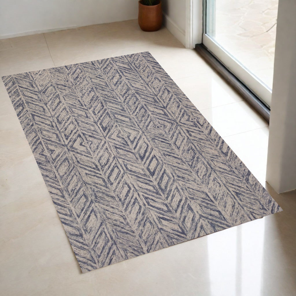 5' X 7' Blue Hand Tufted Wool Herringbone Indoor Area Rug