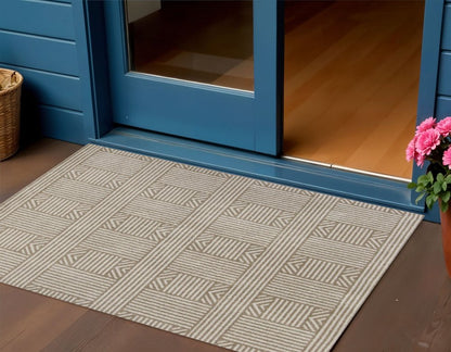 7' X 9' Beige And Ivory Geometric Indoor Outdoor Area Rug