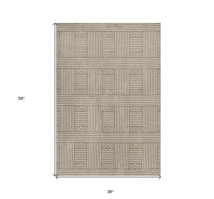7' X 9' Beige And Ivory Geometric Indoor Outdoor Area Rug