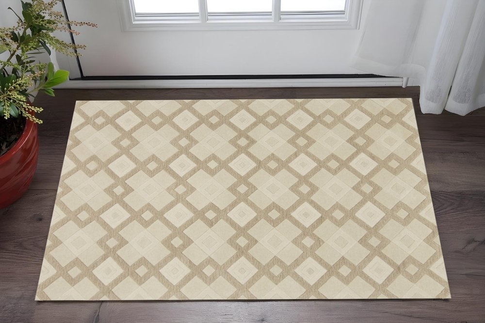 5' X 8' Ivory And Brown Wool Geometric Hand Tufted Area Rug