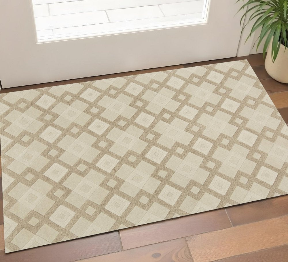 5' X 8' Ivory And Brown Wool Geometric Hand Tufted Area Rug