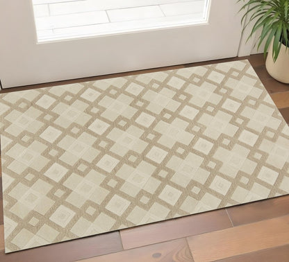 5' X 8' Ivory And Brown Wool Geometric Hand Tufted Area Rug
