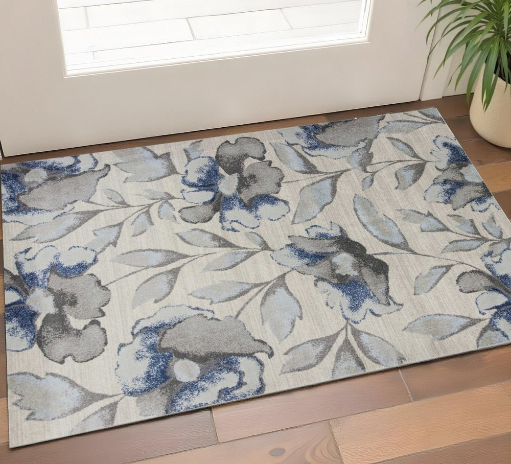 9' X 13' Ivory Blue And Gray Floral Vines Area Rug