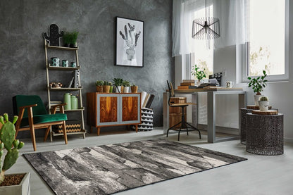 Gray abstract area rug, 8' x 11'.