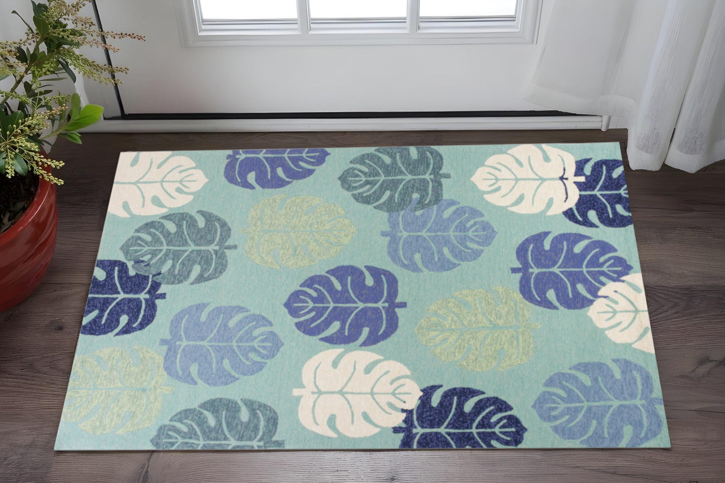 7' X 9' Turquoise And Ivory Botanical Leaves Hand Tufted Area Rug