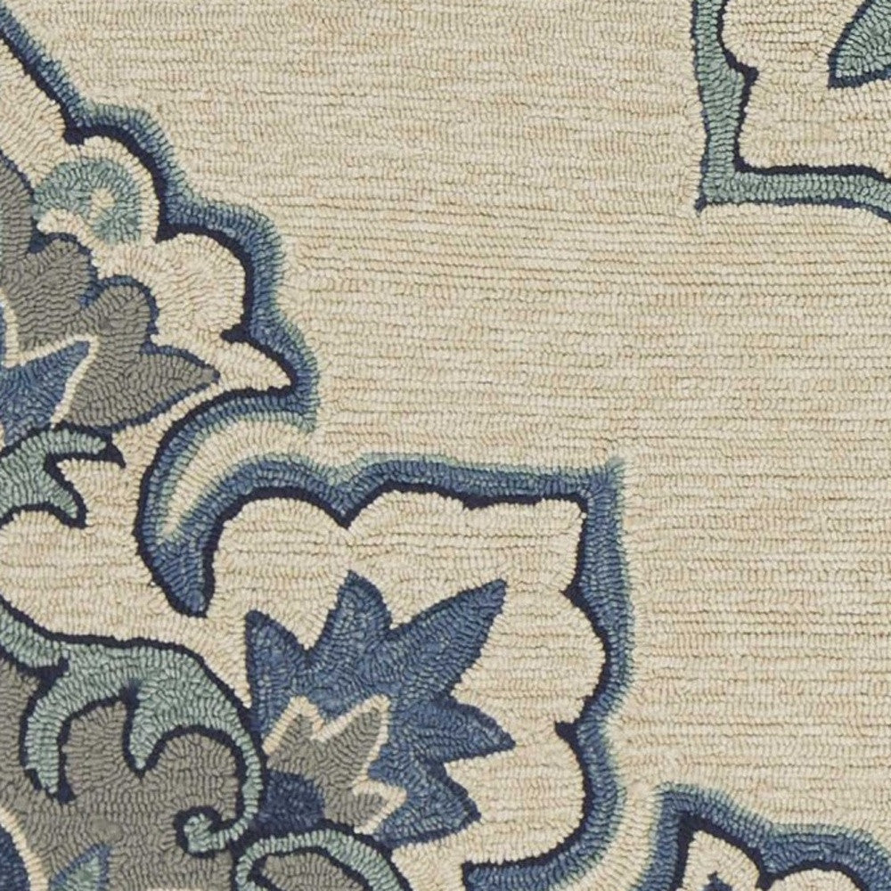 5' X 8' Ivory and Blue Damask Handmade Indoor Outdoor Area Rug