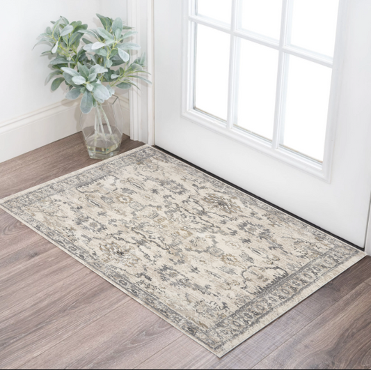 8' X 10' Ivory Machine Woven Distressed Floral Traditional Indoor Area Rug