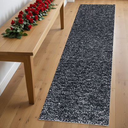 5' X 7' Black And White Shag Hand Woven Area Rug
