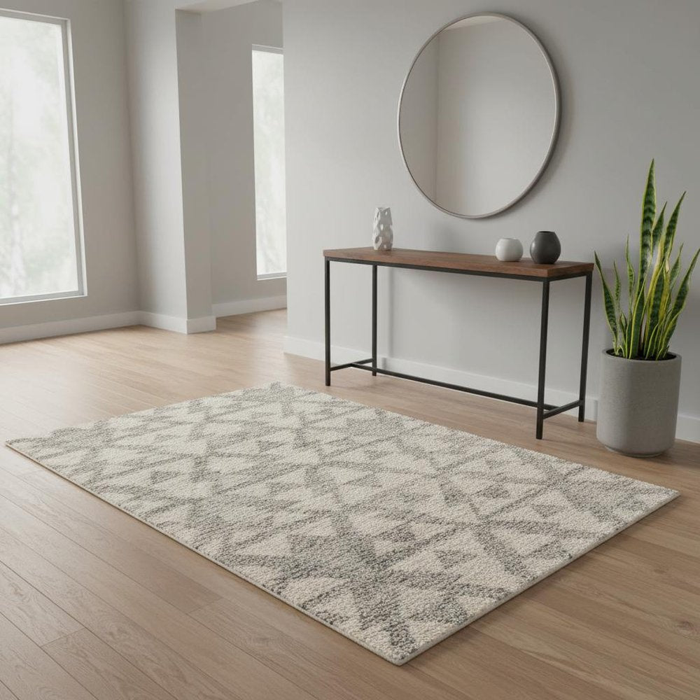 5' X 8' Ivory And Gray Geometric Area Rug