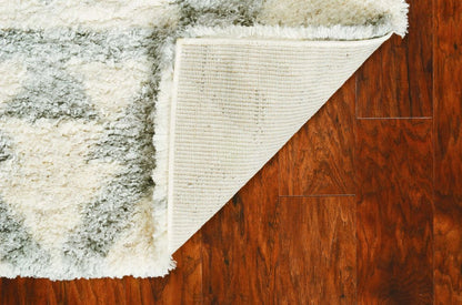 5' X 8' Ivory And Gray Geometric Area Rug