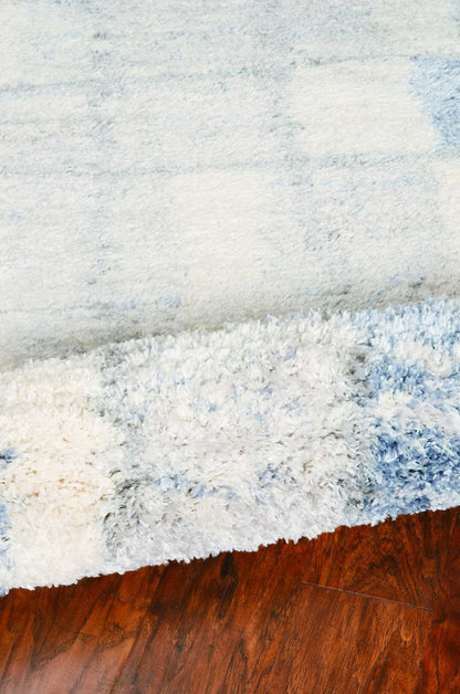 5' X 8' Ivory And Blue Abstract Area Rug