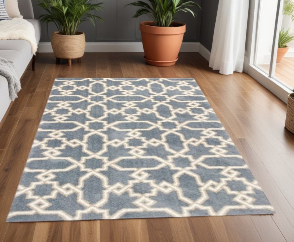 5' X 8' Slate Blue And Ivory Geometric Area Rug