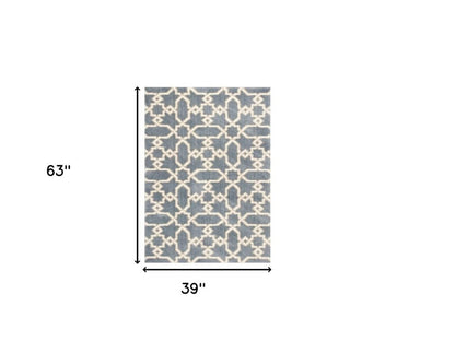 3' X 5' Slate Blue And Ivory Geometric Area Rug