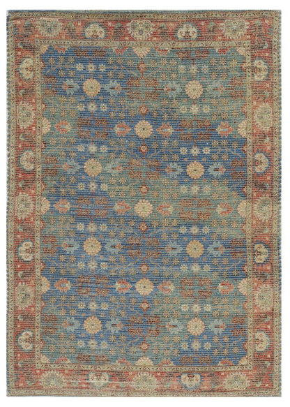 5' X 7' Blue Red And Beige Floral Medallion Hand Woven Distressed Area Rug