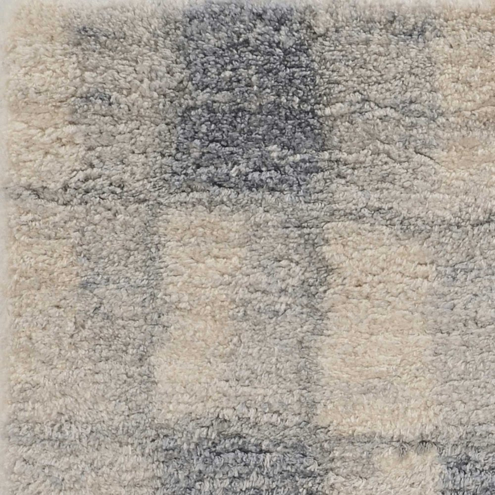 5' X 8' Ivory And Blue Abstract Area Rug
