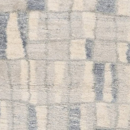 5' X 8' Ivory And Blue Abstract Area Rug