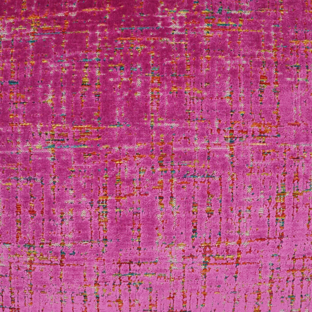 Magenta woven fabric with abstract gold and orange thread accents and hints of blue-green.