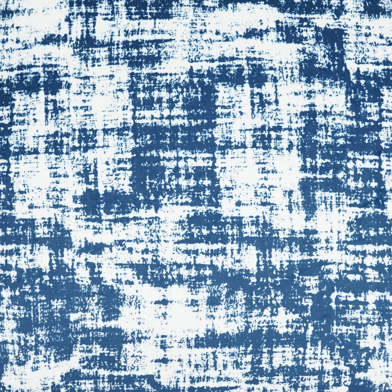 Blue and white distressed fabric pattern with abstract brushstroke grid texture.