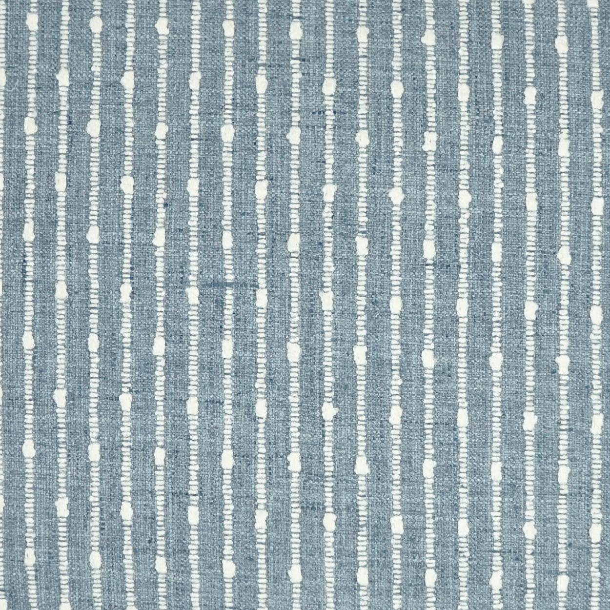 Blue denim-striped pillow with white vertical dotted lines, 24 x 24 inches