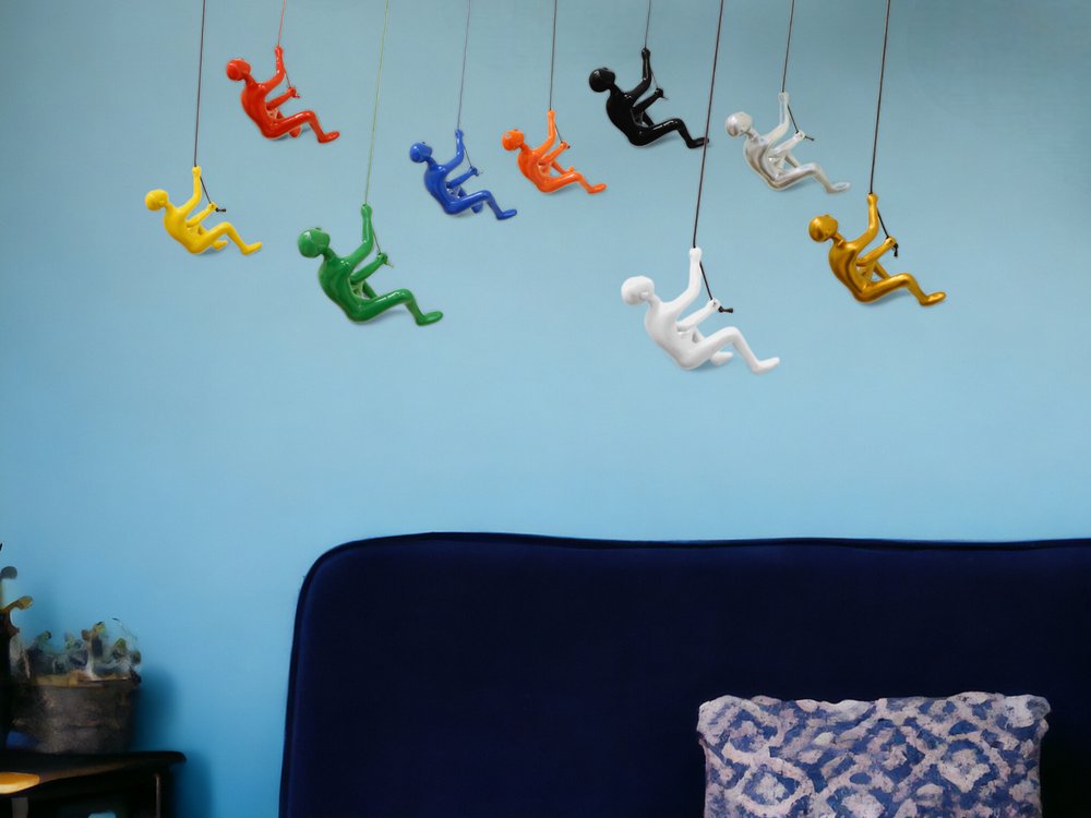 Set of Nine Rainbow Resin Climbing Man Hanging Dimensional Sculpture