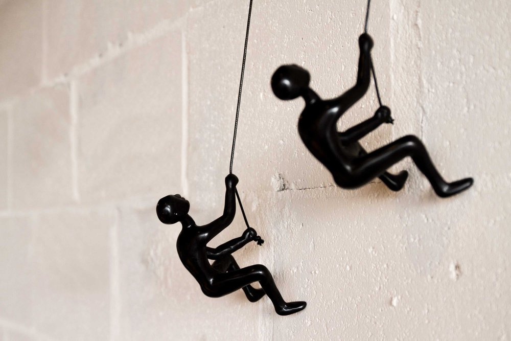 Set of Two Black Resin Climbing Man Hanging Dimensional Sculpture