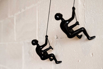 Set of Two Black Resin Climbing Man Hanging Dimensional Sculpture