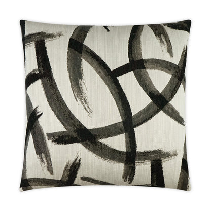 Beige square throw pillow with bold black abstract brushstrokes; textured fabric, modern art-inspired decor.