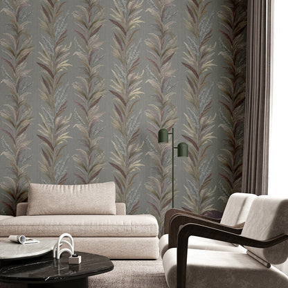 Living room with leaf flourish wallpaper in grey and bronze embossed pattern, beige sofa, black marble coffee table, green floor lamp, curved wood armchair.