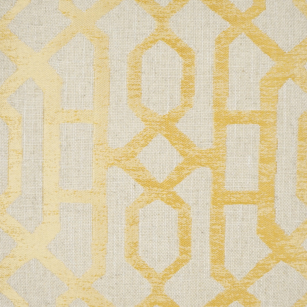 Beige linen fabric with golden-yellow geometric lattice pattern; warm woven texture for upholstery or curtains.