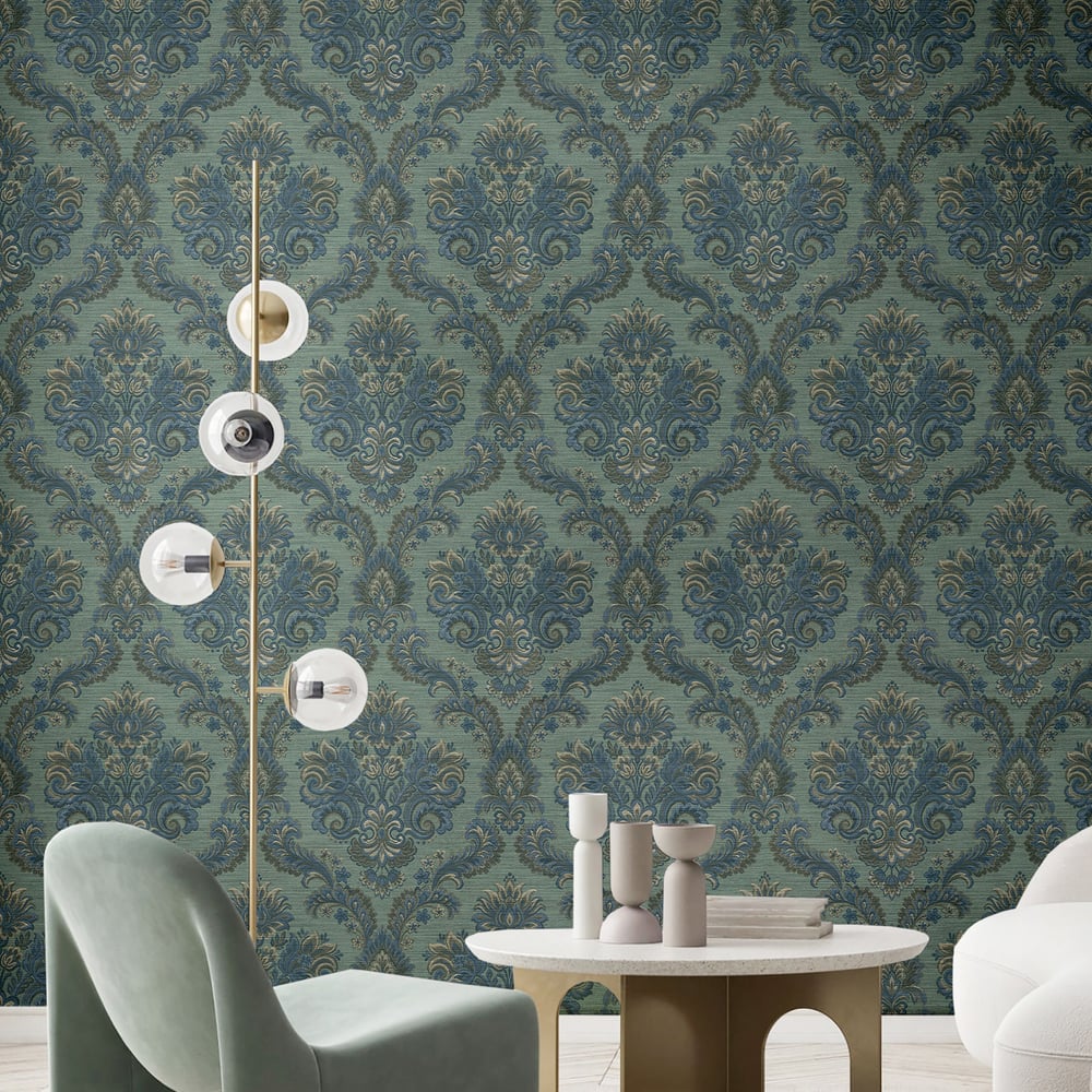 Gold metal floor lamp with multiple glass globes beside a round marble table in a blue damask wallpaper room.