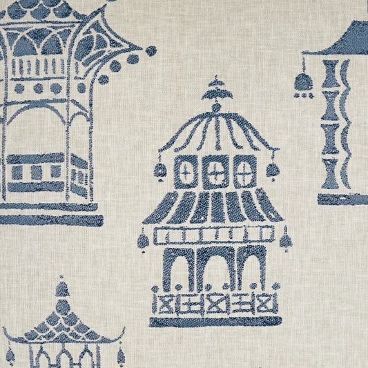 Beige linen-like fabric with blue temple and pagoda motifs; decorative textile for upholstery or curtains.
