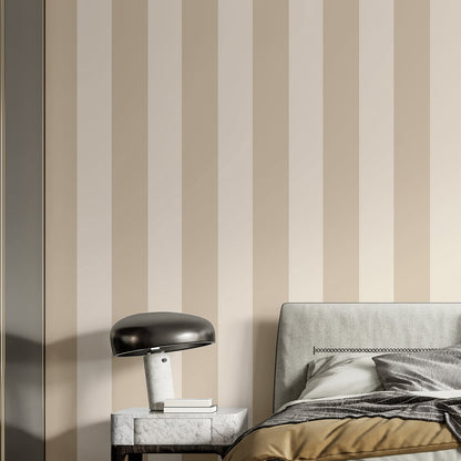 Beige and cream wide-stripe textured wallpaper on a wall.