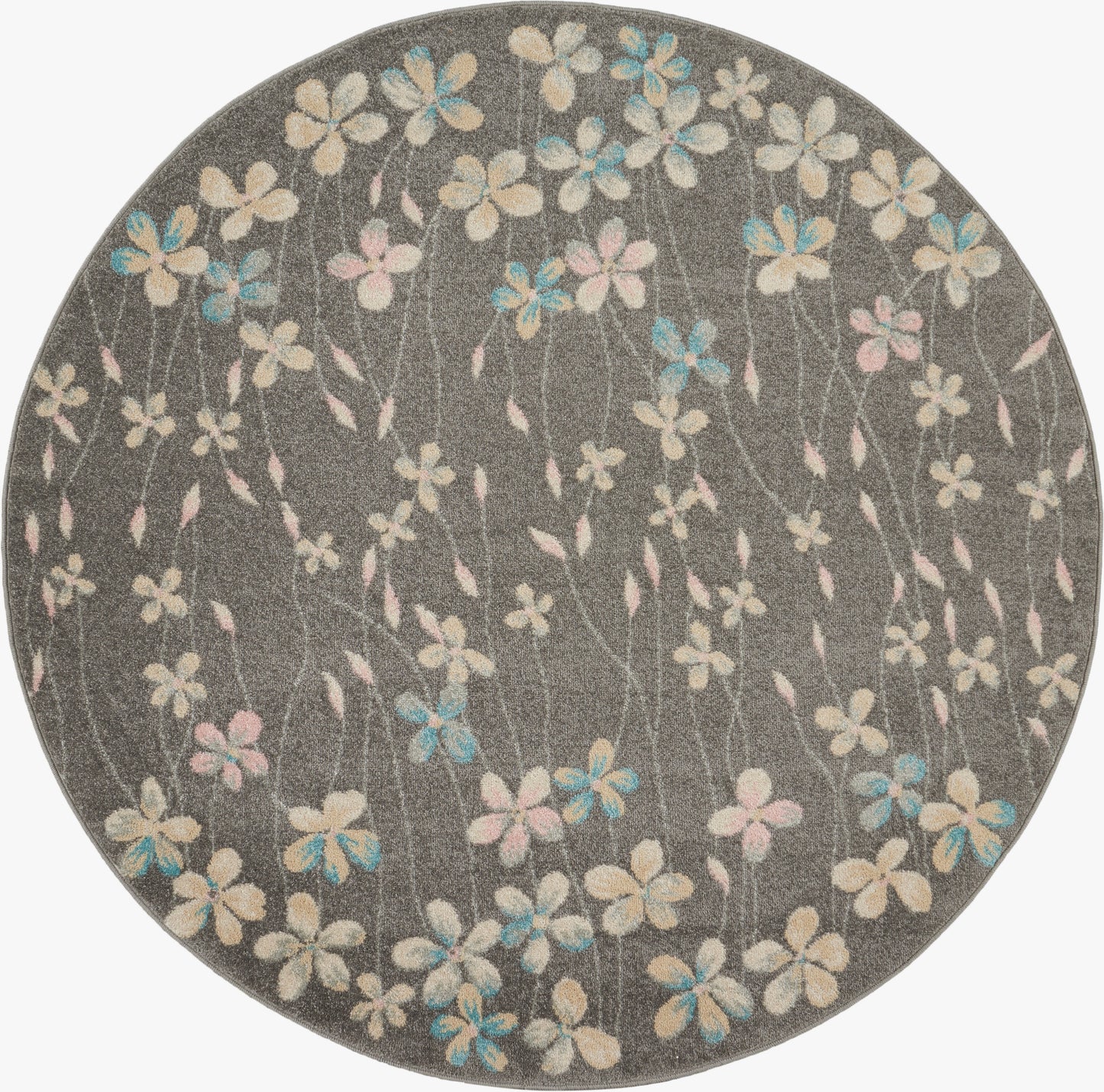 Round gray rug with scattered pastel blue, pink and cream flowers.