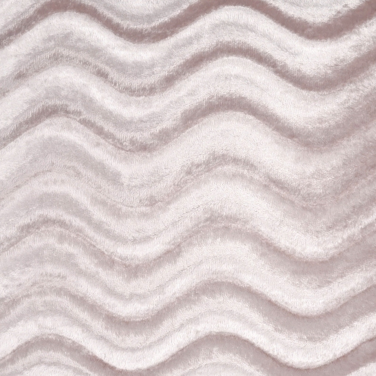 Soft pale pink plush fabric with ridged, wavy pattern; fur-like texture for throws or upholstery.