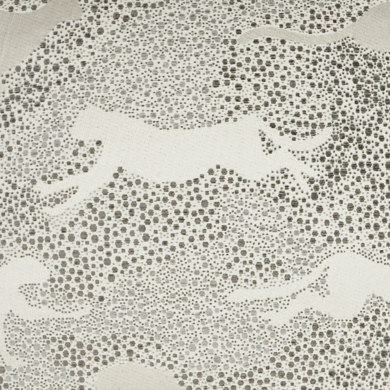 Cream lace fabric with dotted circular motifs in a soft floral pattern; delicate, airy, ideal for dresses or decor.